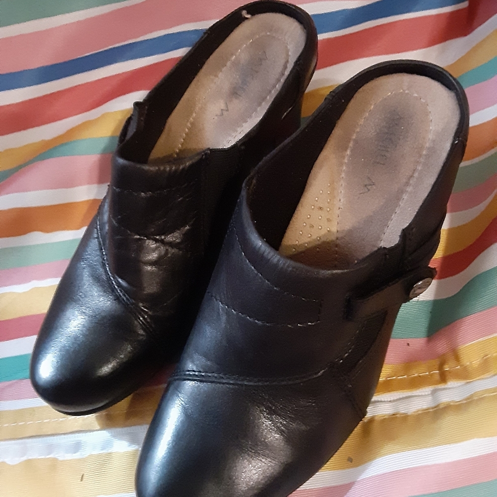 Small heeled black slip on mules